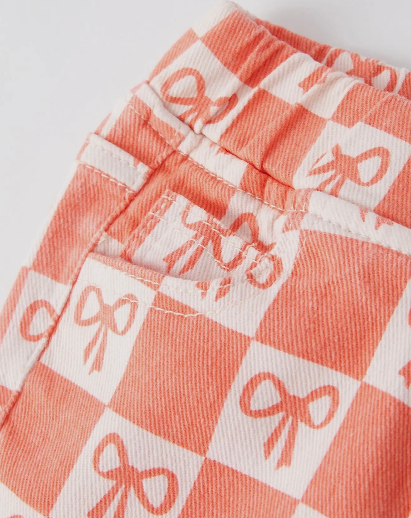 Coral Bow Plaid Flared Pants